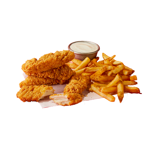 A plate of fried chicken and french fries with a dipping sauce.