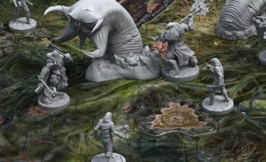 Miniature figures on a game board, facing a large worm-like monster.