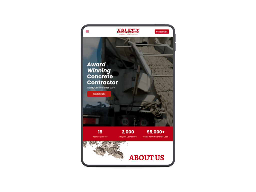 A tablet with a concrete contractor website on it.