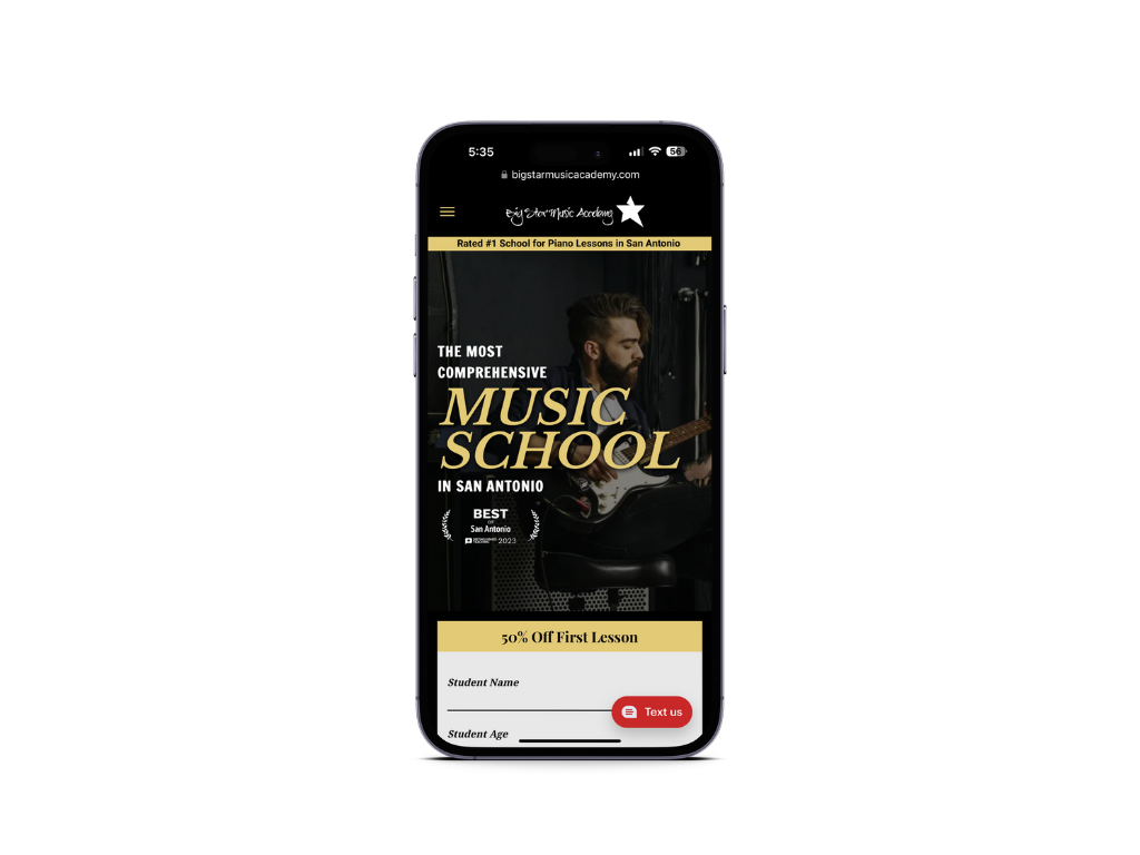 A cell phone with a music school website on it.