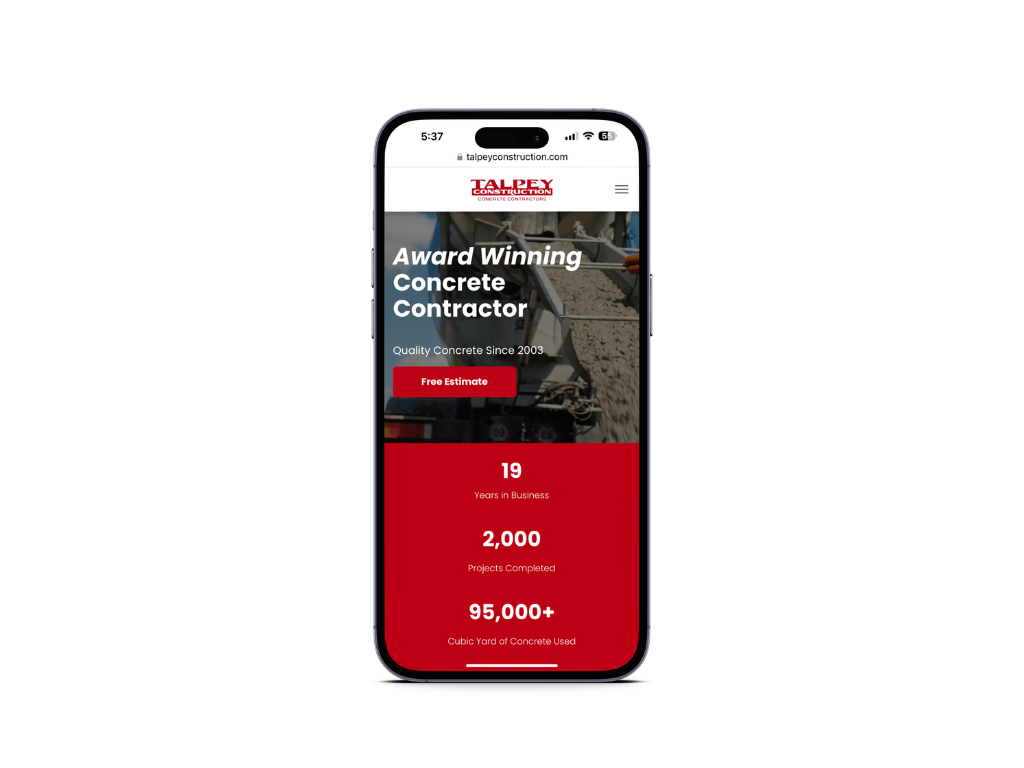 A cell phone with a concrete contractor website on it.