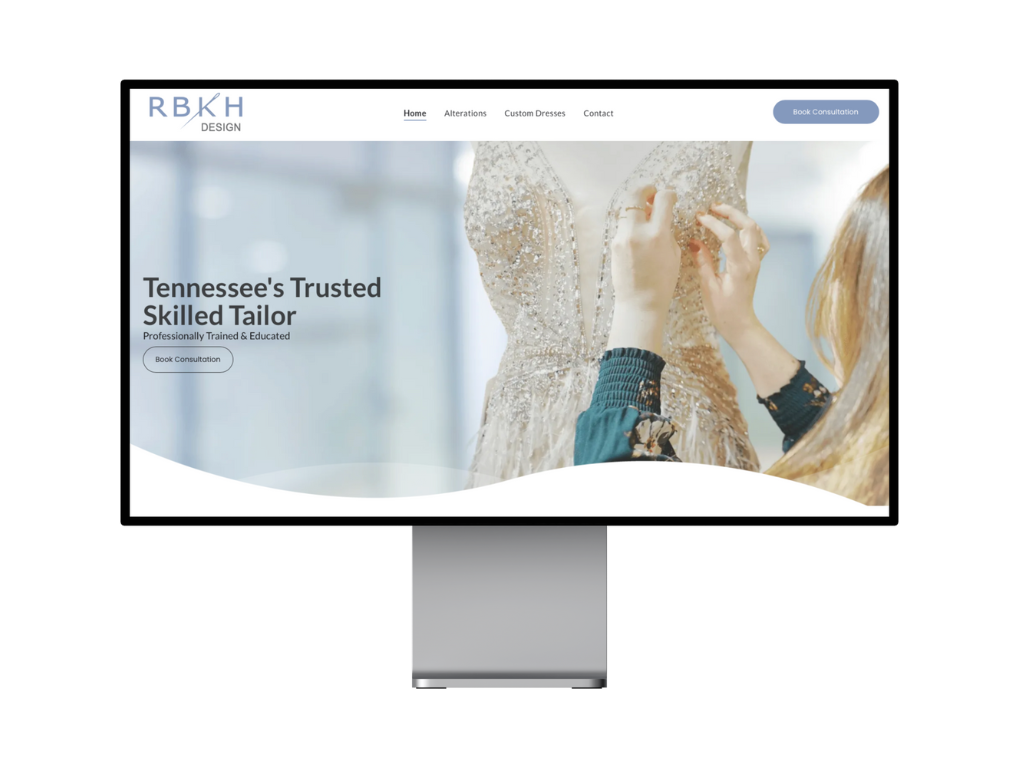 A computer monitor displaying a website for tennessee 's trusted skilled tailor.