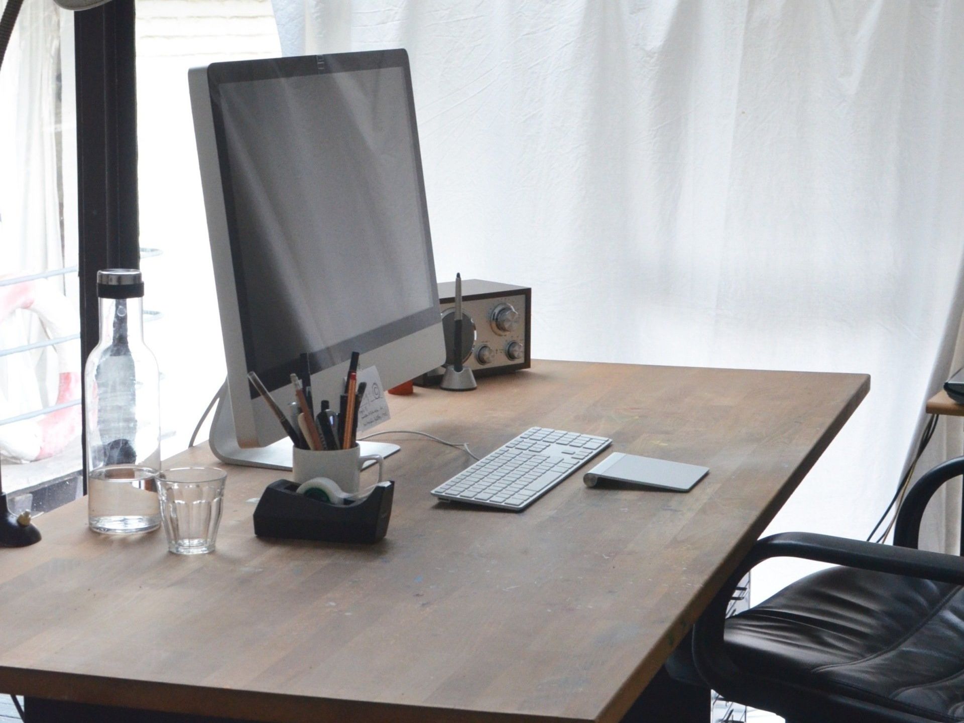 desk with laptop and mousepad