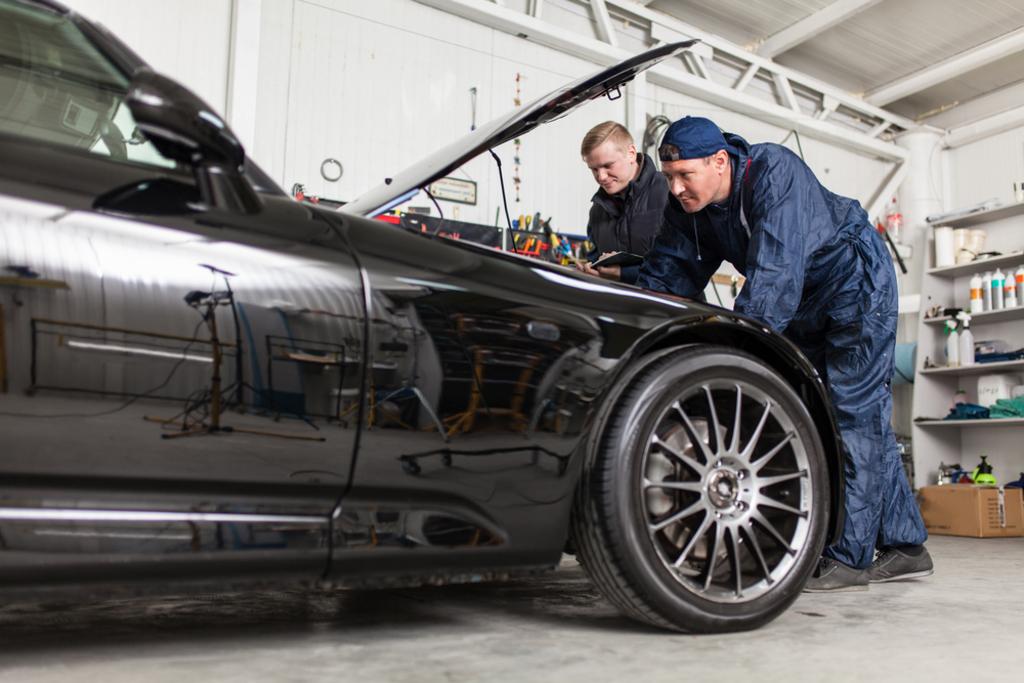 Two Car Mechanics