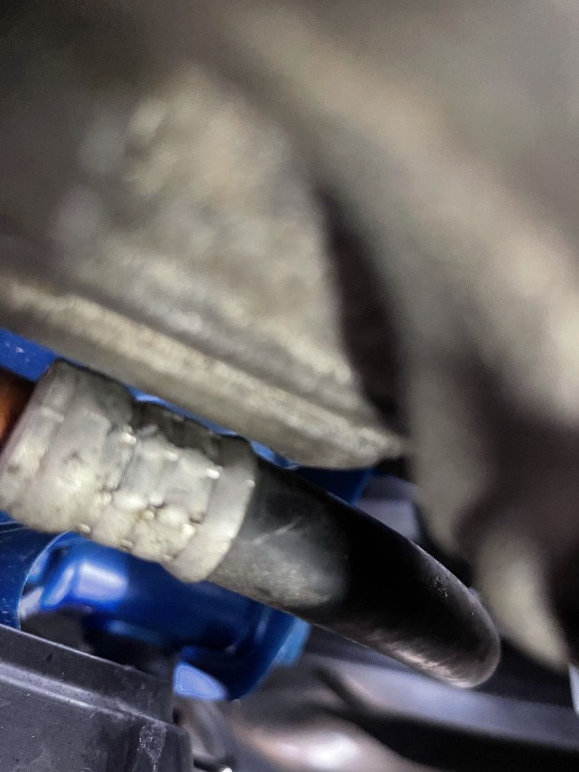 A Close Up of a Hose on the Side of a Car — Cool Cats Auto Air in Urangan, QLD