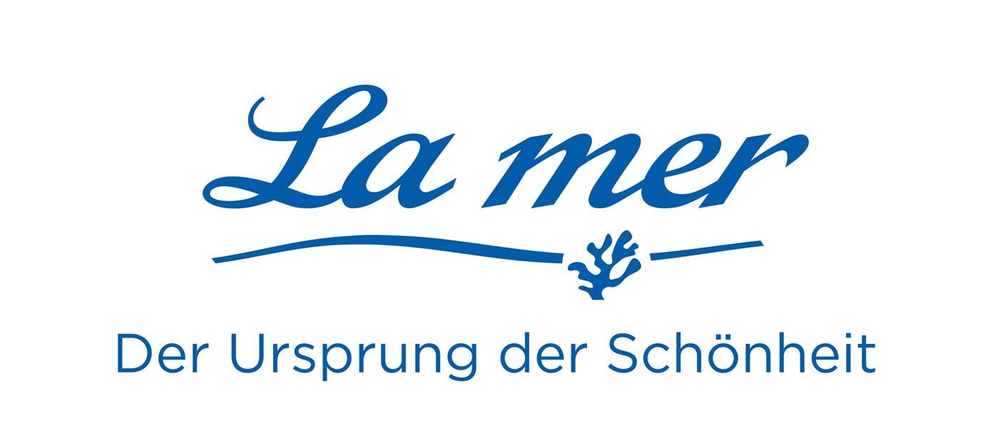 A blue and white logo for la mer der ursprung der schönheit