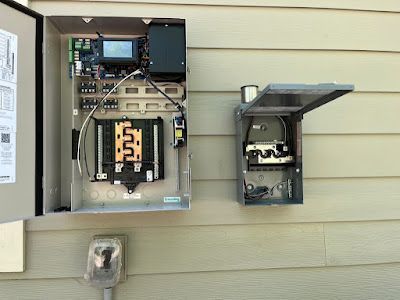 A person is installing a light switch on a wall.