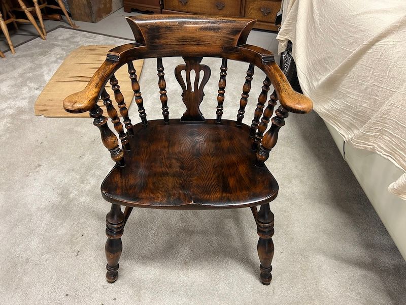 A Lovely Elm Captains Chair sold by Brights of Nettlebed