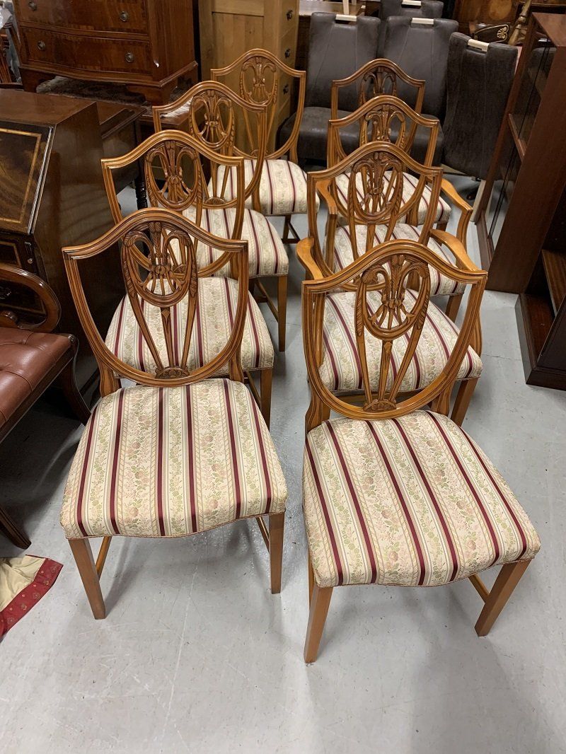 A Set of Eight Bevan Funnell Shieldback Prince of Wales Feather Dining Chairs