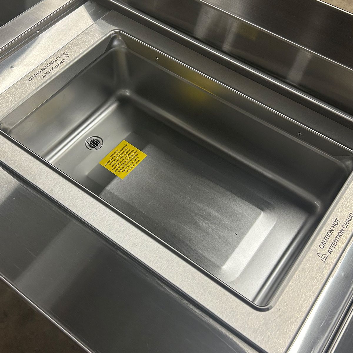 Food Service Equipment Fabrication An example of a polished sink welded onto a push-line done by Integrus Fabrication.