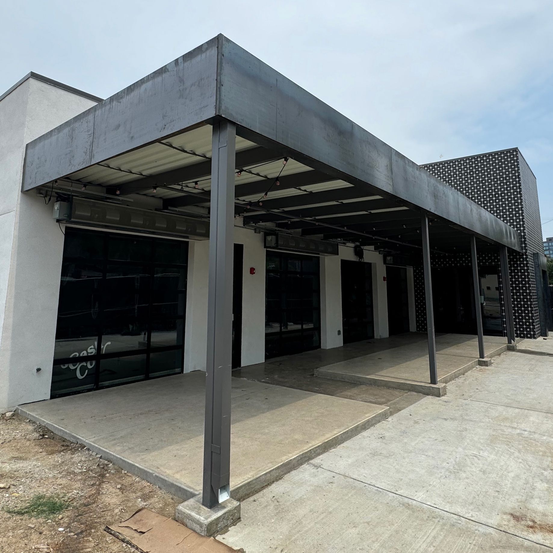 Metal Fabricated commercial awning  installed by the Integrus Fabrication team at Cash Cow in Dallas