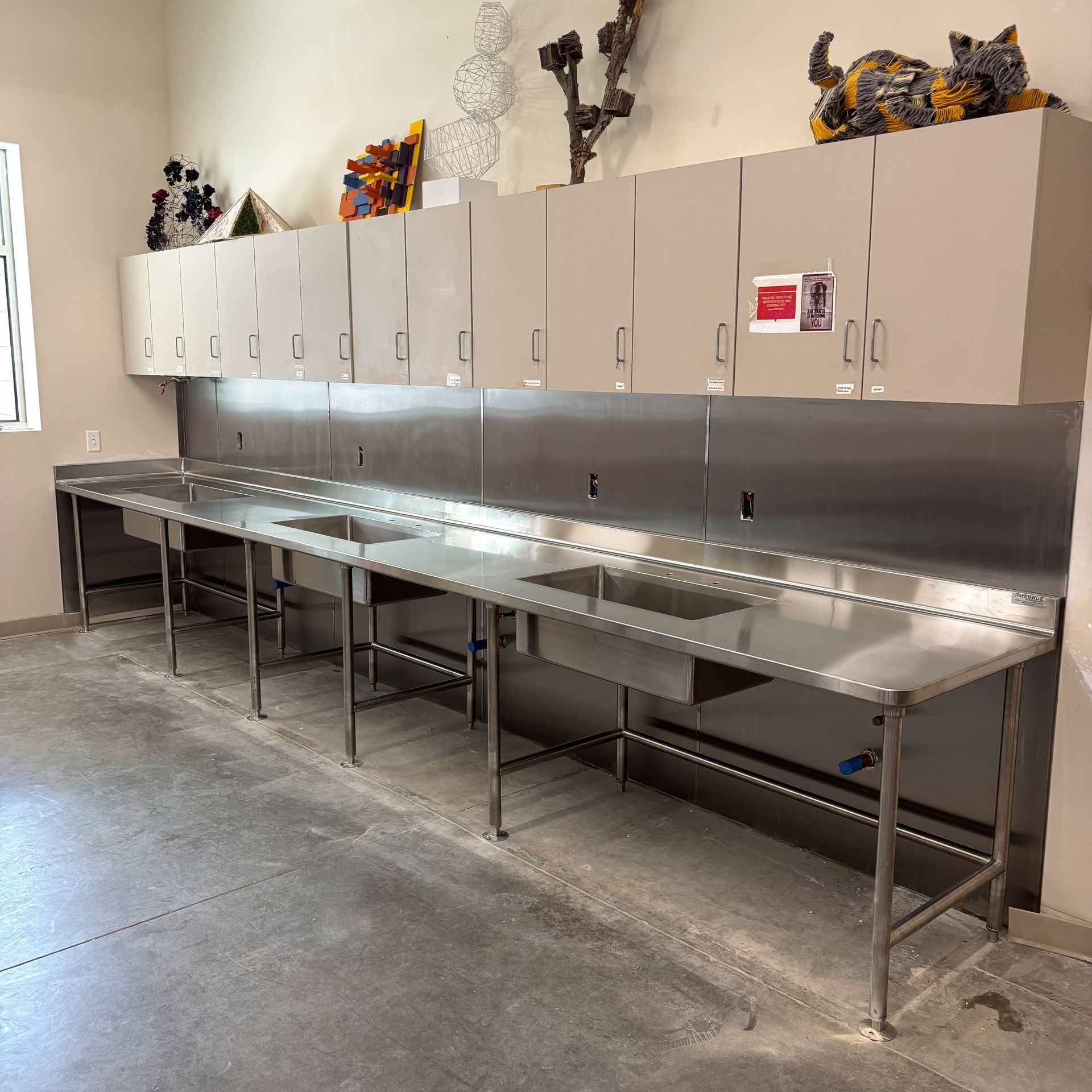 Photo of Metal Fabricated Stainless Steel Triple Sink Station. Welded  and installed by Integrus at Wichita Falls ISD