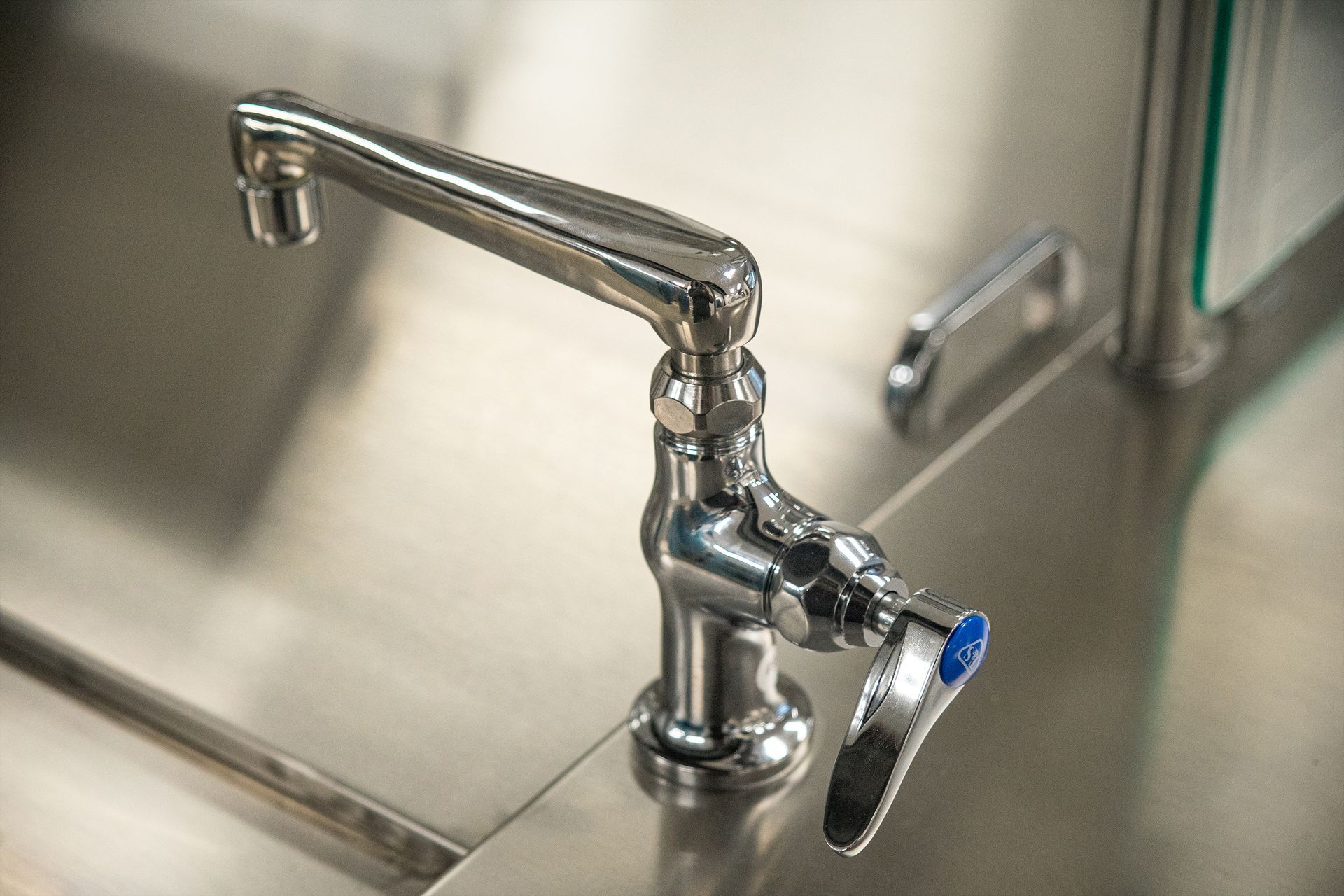 Photo of faucet on serving line