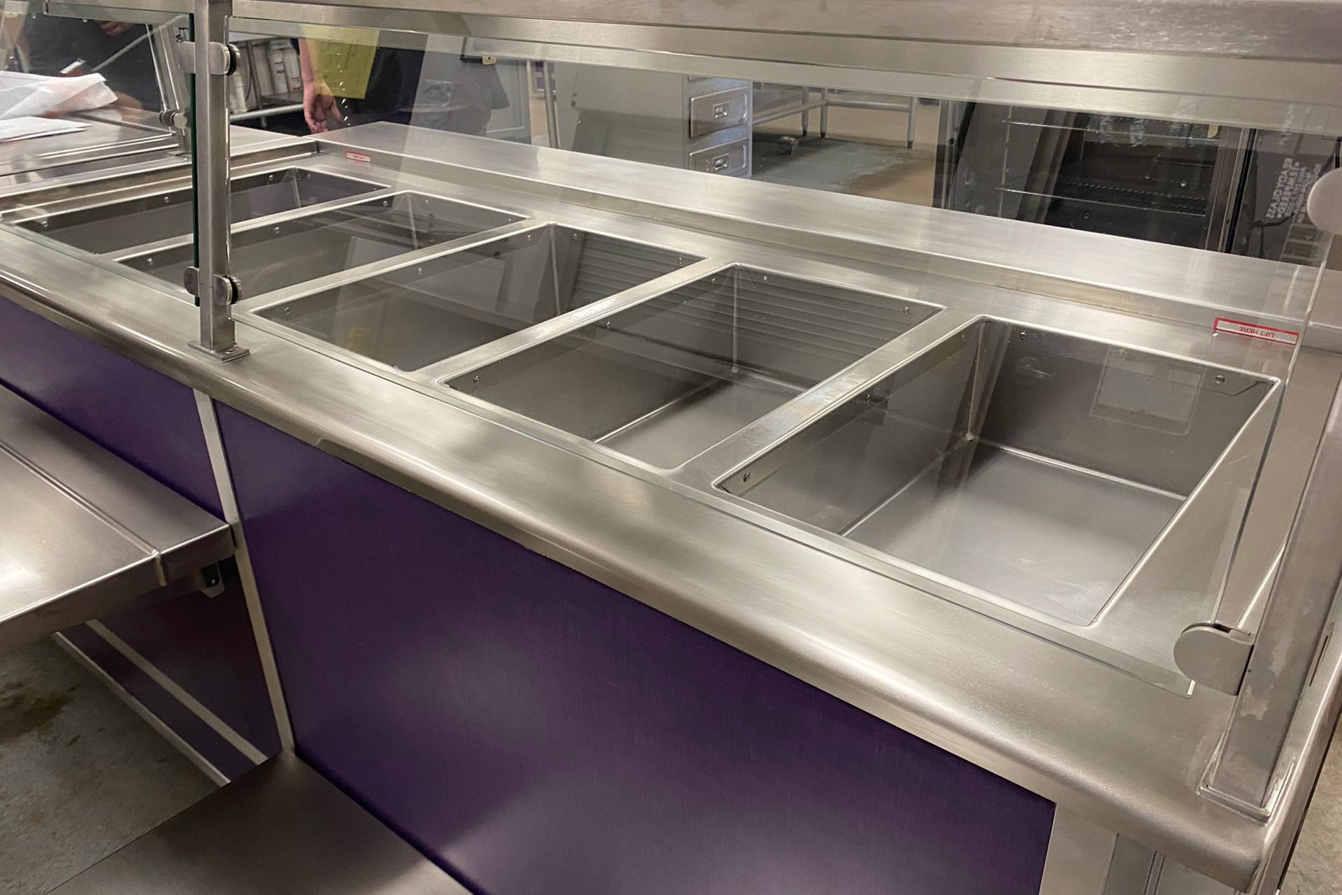 Photo of serving line steam pan bays