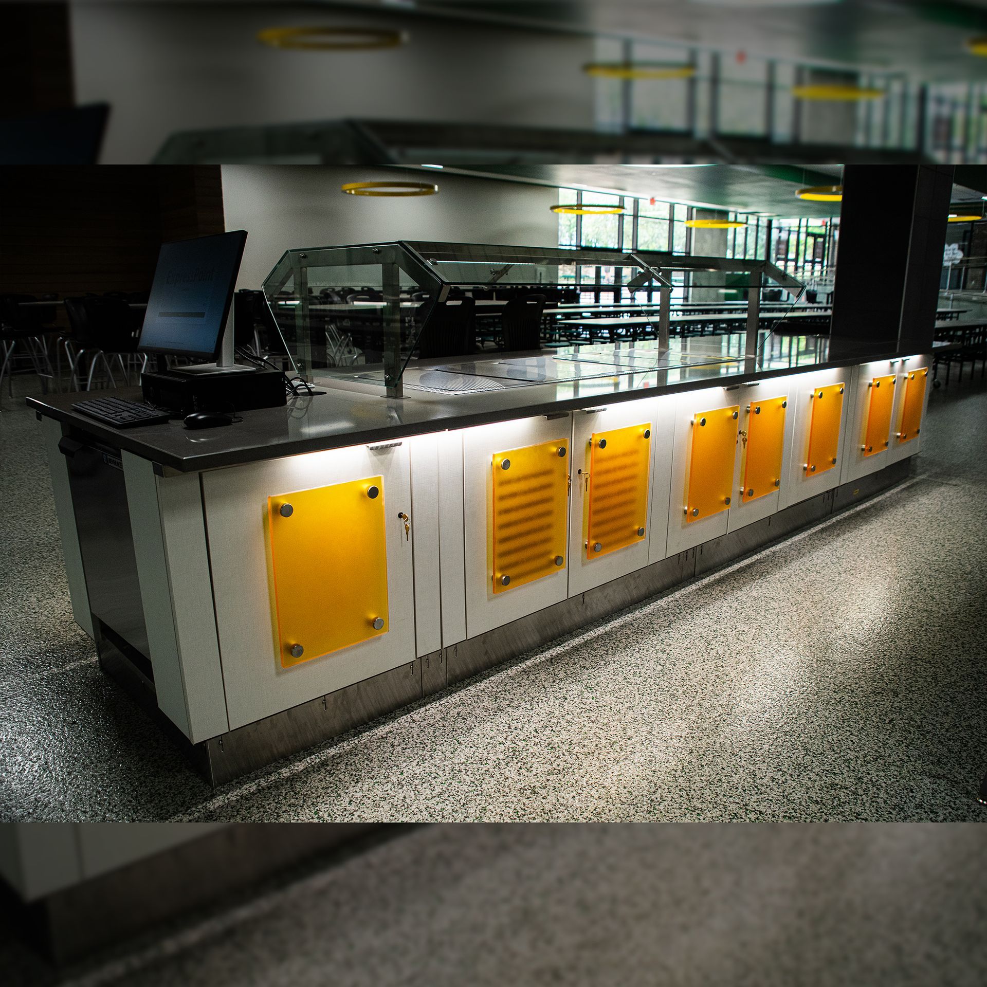 Photo of Cafeteria Serving Line installed by Integrus Fab at a public school with Yellow Accents