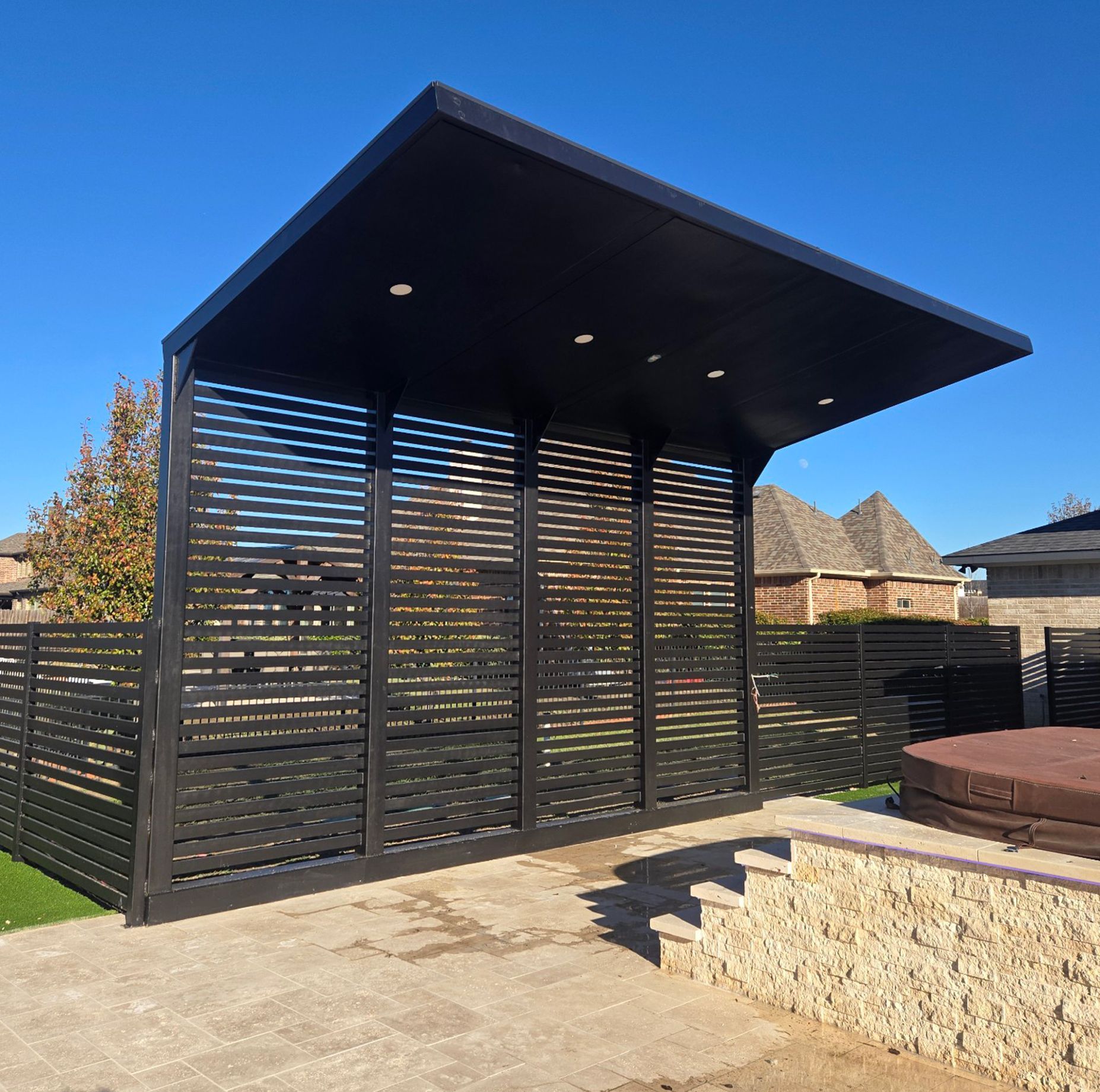 Metal Fabricated / Welded Awning  installed by the Integrus Fabrication team at  a private residential home