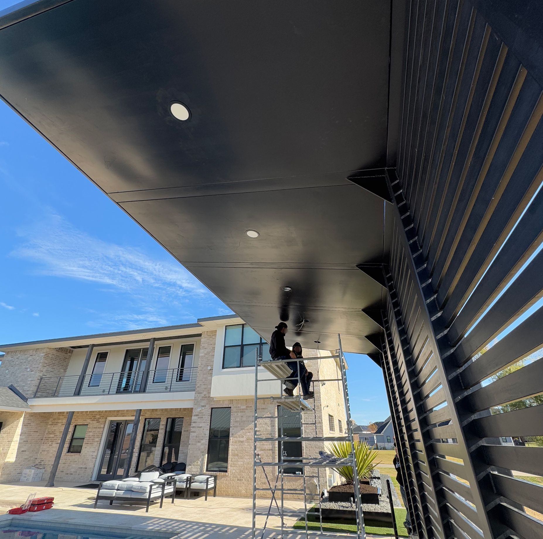 Metal Fabricated / Welded Awning  installed by the Integrus Fabrication team at a private residential home