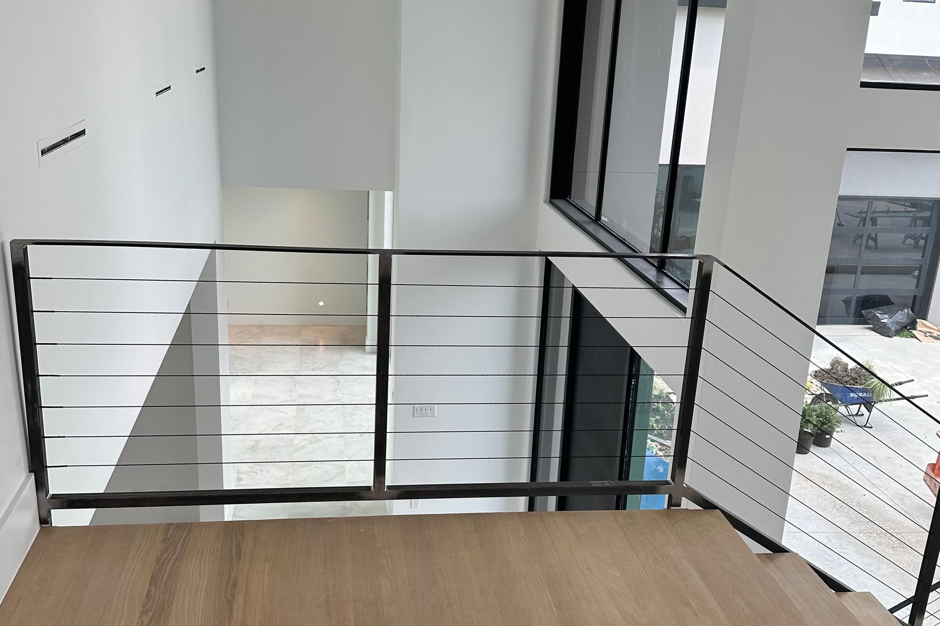 Photo of cable railing installed at a private residence, view from upstairs