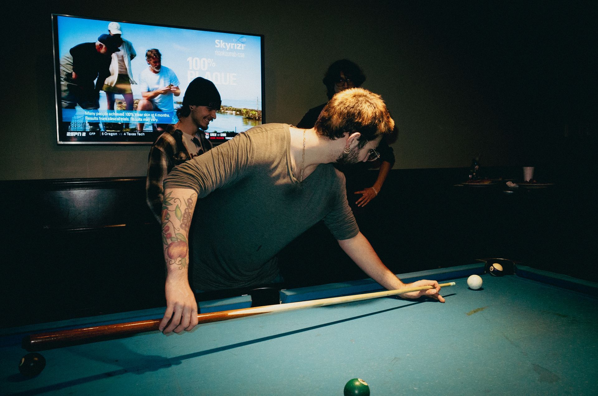 Photo of Integrus Fabrication team member during the Christmas Party playing Pool in 2025