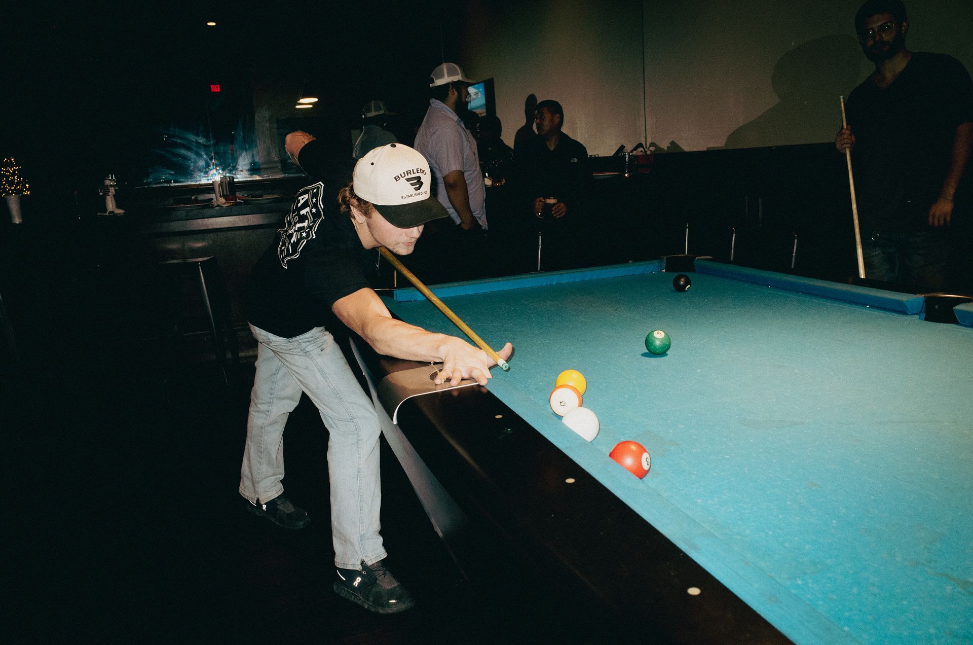 Photo of Integrus Fabrication team during the Christmas Party playing Pool in 2025