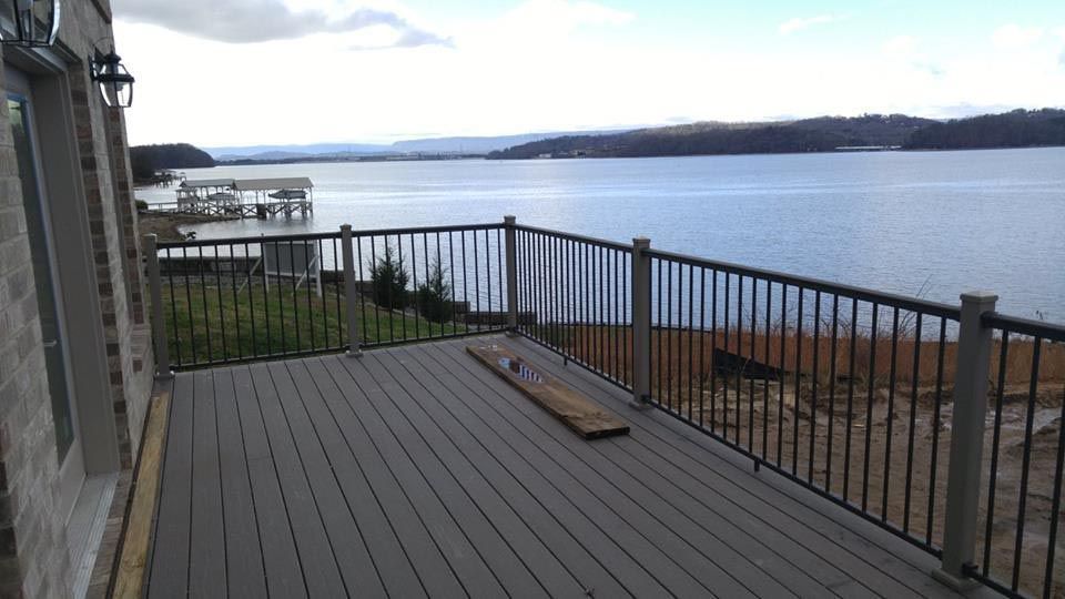 New deck overlooking the water with grey decking