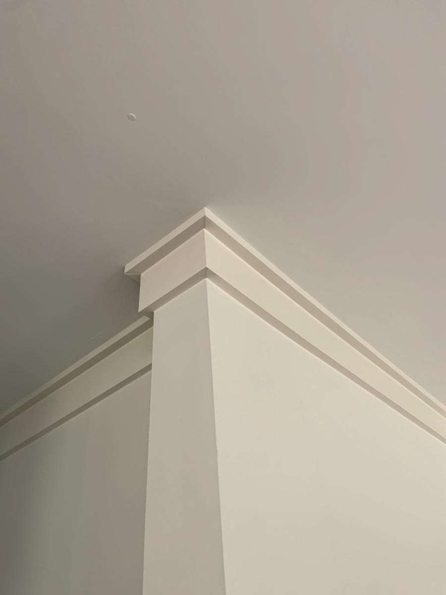 White crown molding where the wall meets the ceiling.