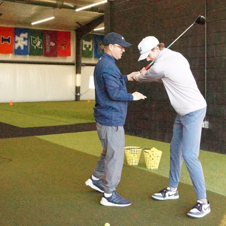 jason eberle conducting a golf lesson