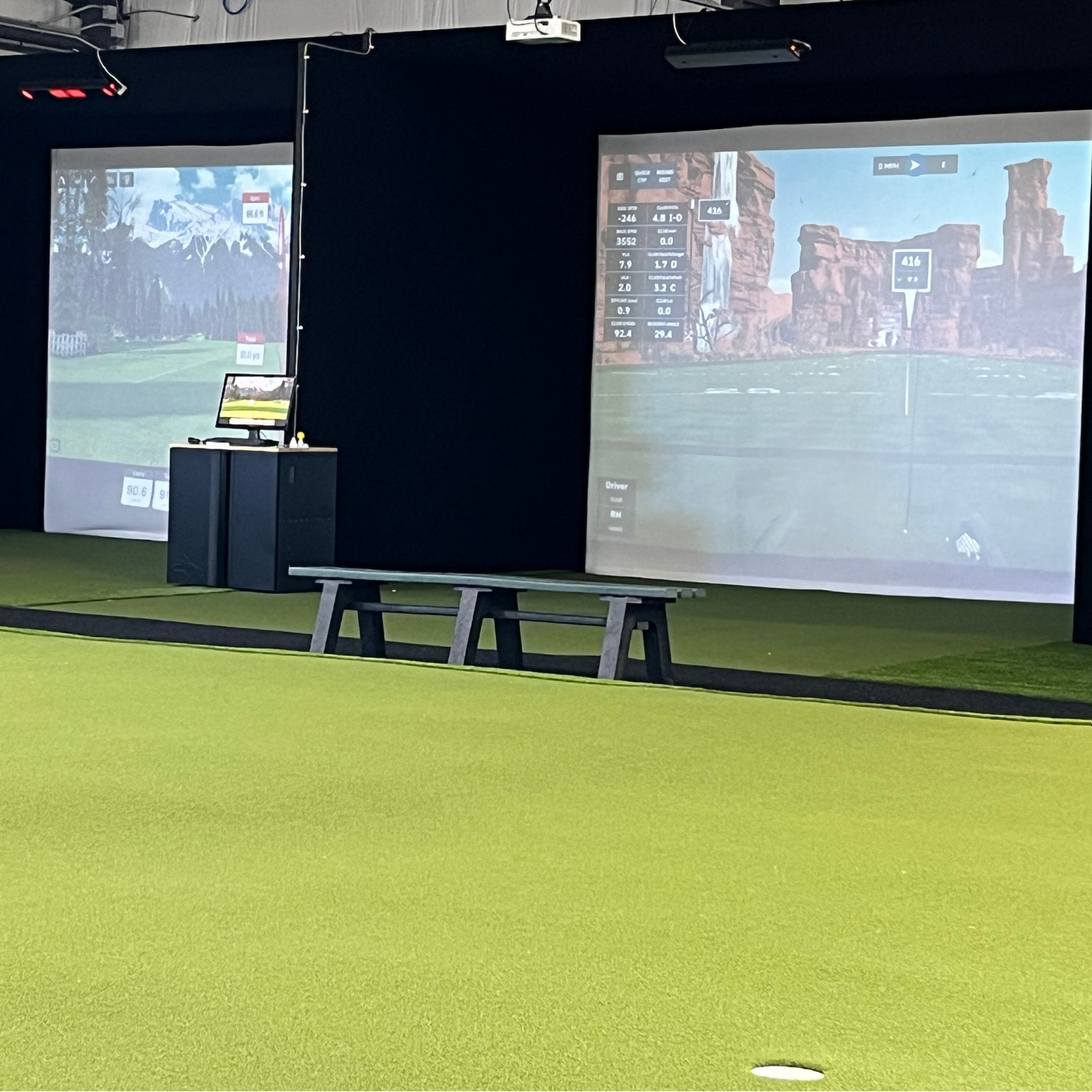 image of the golf simulators at gibson bay golf garage