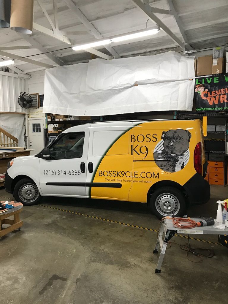 White delivery van with yellow 