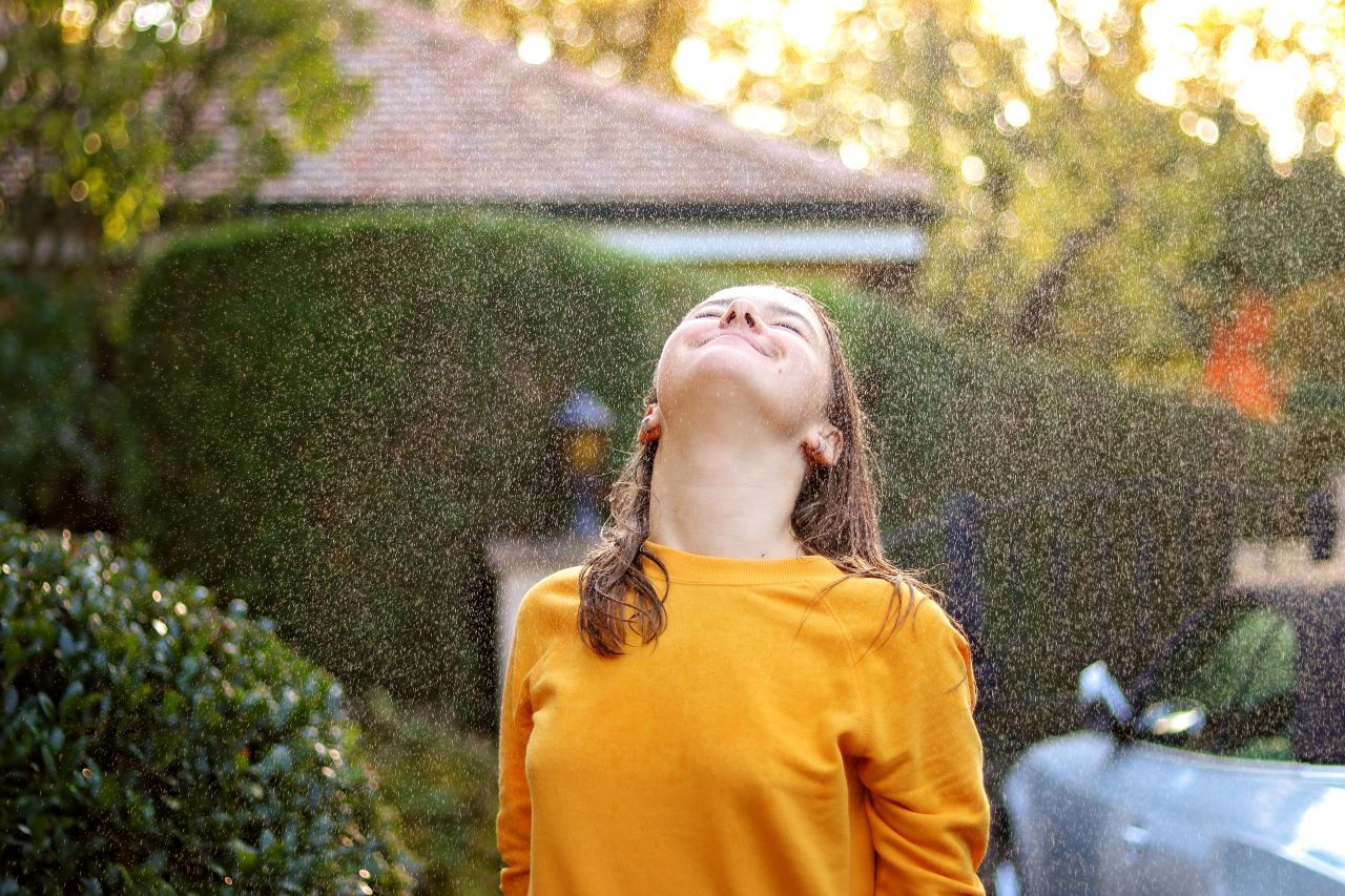 Girl Enjoying Rain