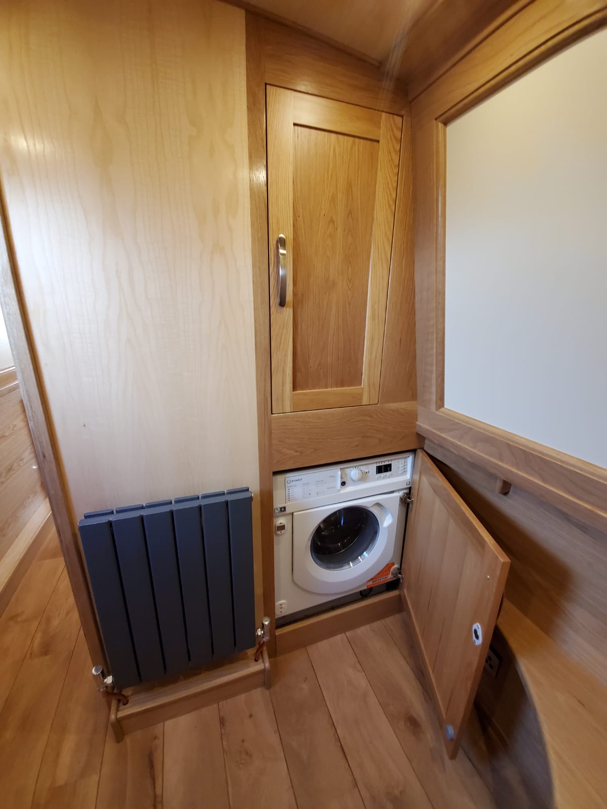 Kiiruna utility room with washing machine