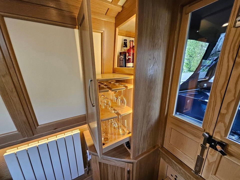 Maria drinks and glass cabinet