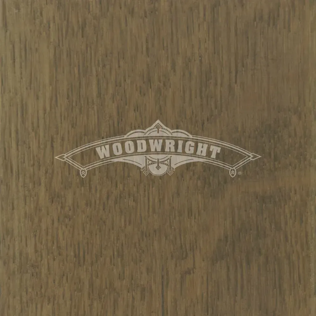 Woodwright logo on brown wood grain background.