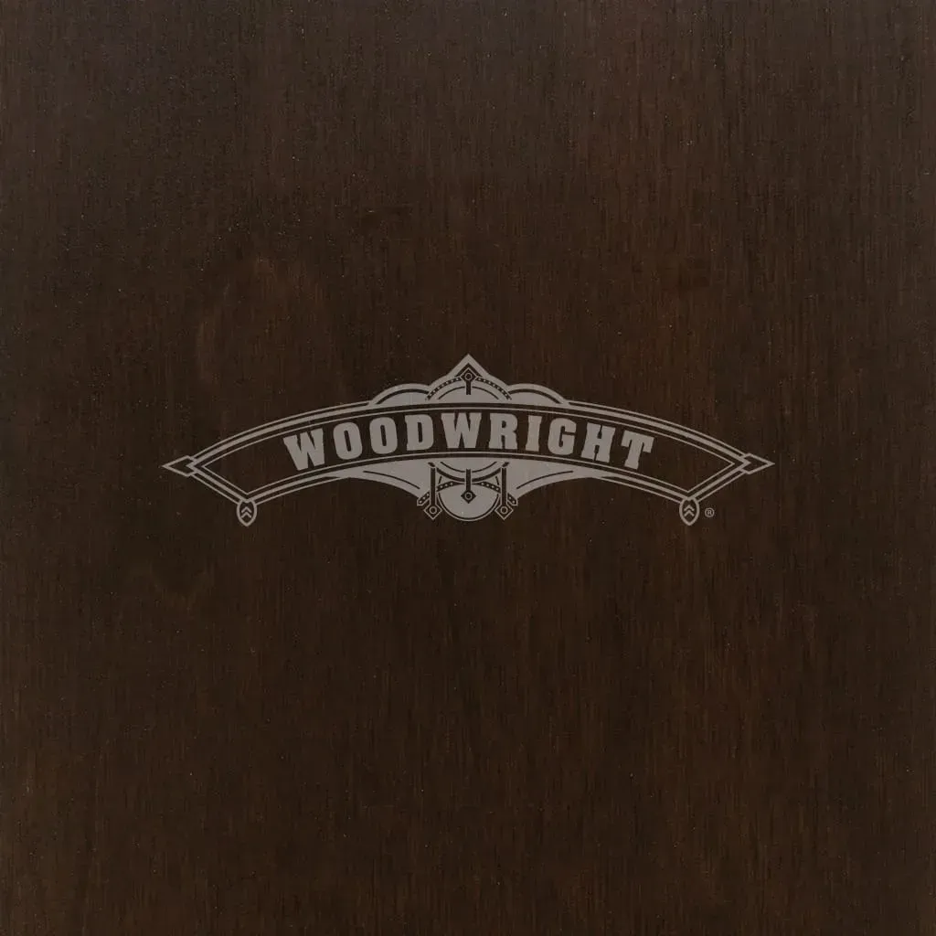 Dark brown wooden surface with the word 