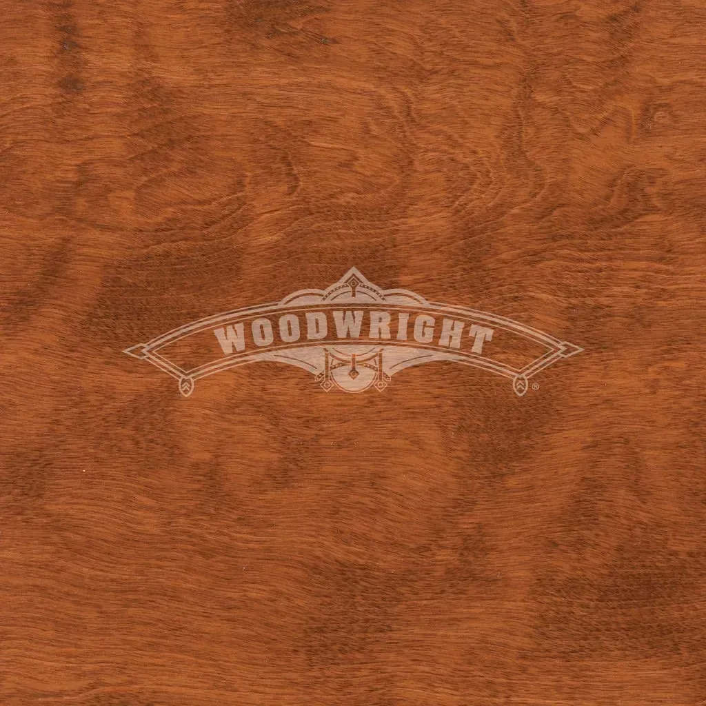Woodwright logo on stained wood background.
