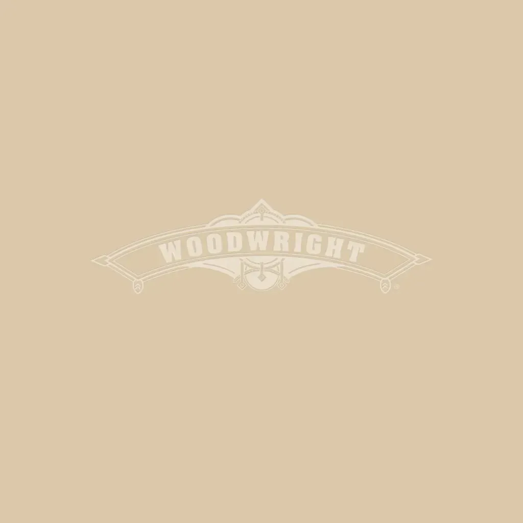 Logo for Woodwright, a cream-colored banner with the name and a central decorative design.