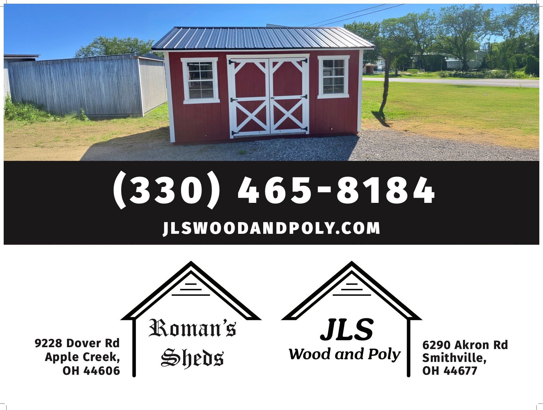 Red shed with white door, phone number, and website address for shed company.