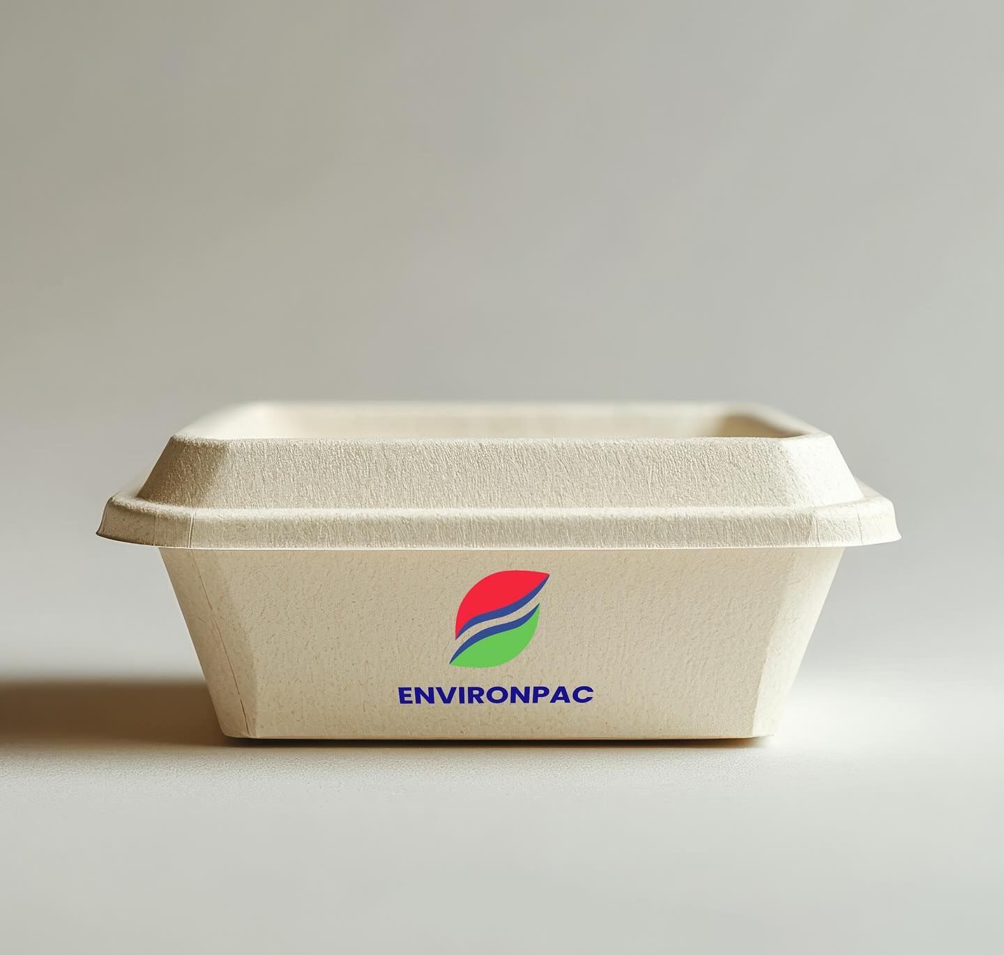 Beige compostable food container with lid, green/red logo, "ENVIRONPAC" text.