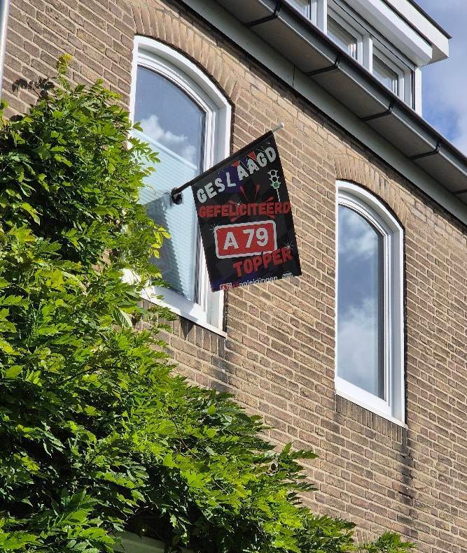 Een bord met de tekst 