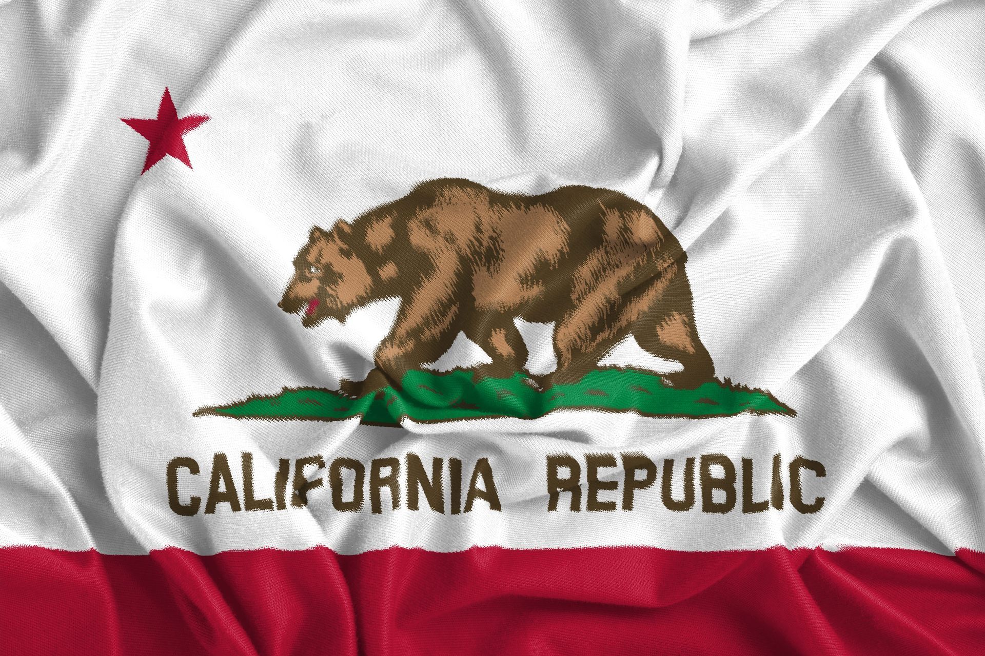 California Republic flag with a bear, red star, and red stripe on a white background