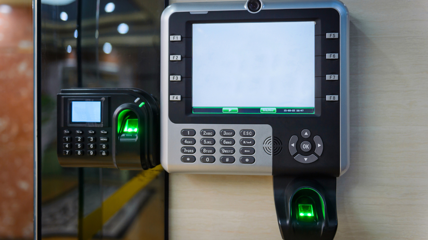 A person is using a smart card to open a door.