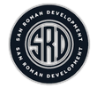 San Roman Development circular logo in navy, white, and silver with stylized SRD initials