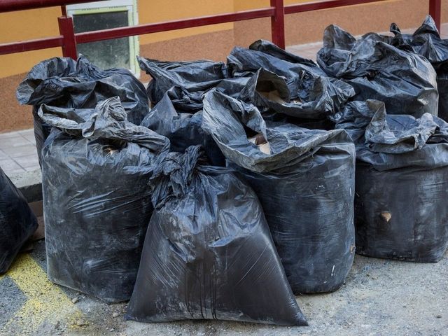 Piles of rubbish and rubble waiting to be removed in Cardiff