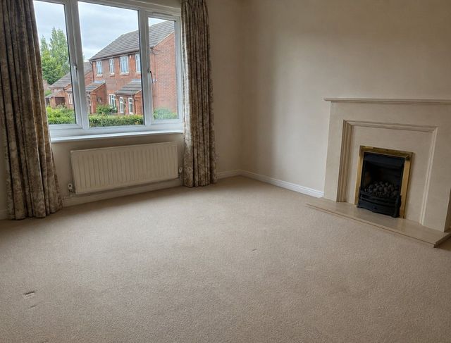 Living room cleared after bereavement house clearance in Cardiff