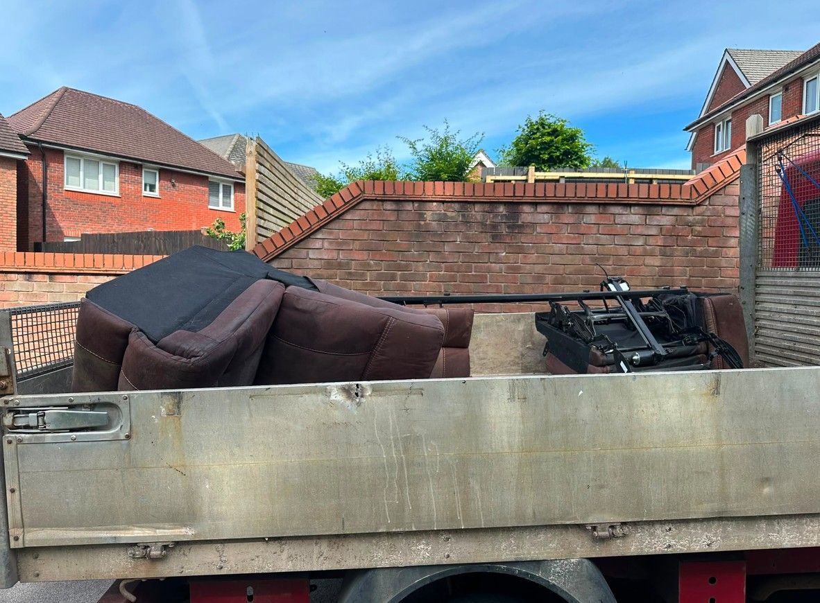 Sofa collection loaded in truck by J&Z House Clearance Cardiff
