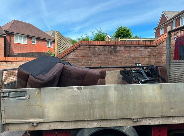 Sofa collection loaded in truck by J&Z House Clearance Cardiff