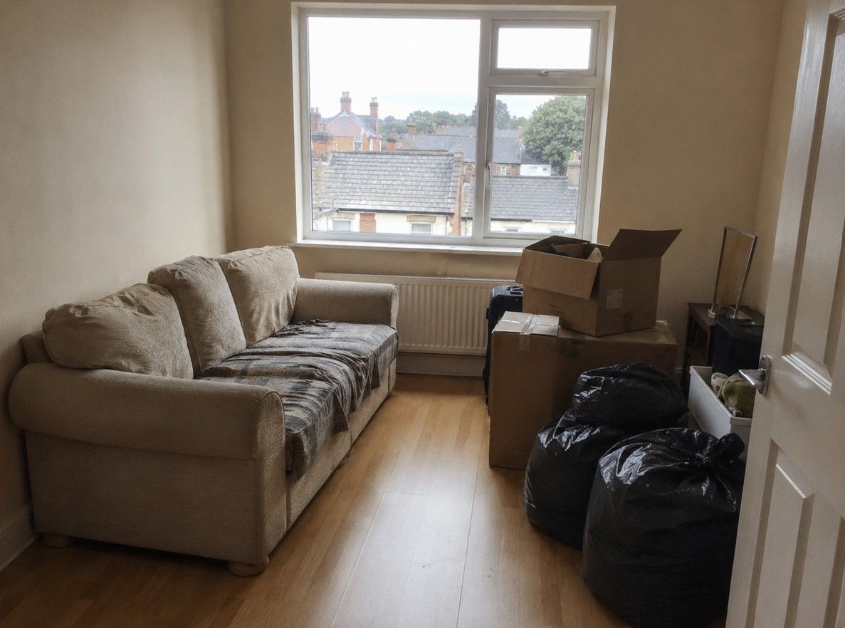 Flat living room before clearance in Cardiff