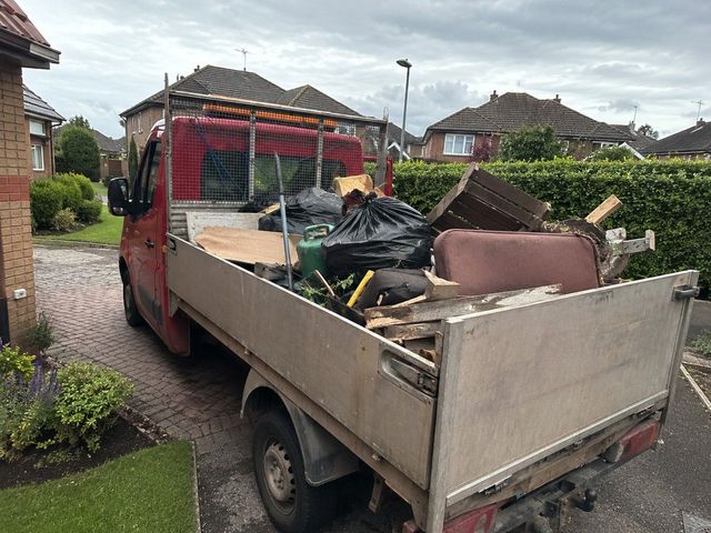 Shed contents and the dismantled shed loaded onto the J&Z House Clearance Cardiff vehicle