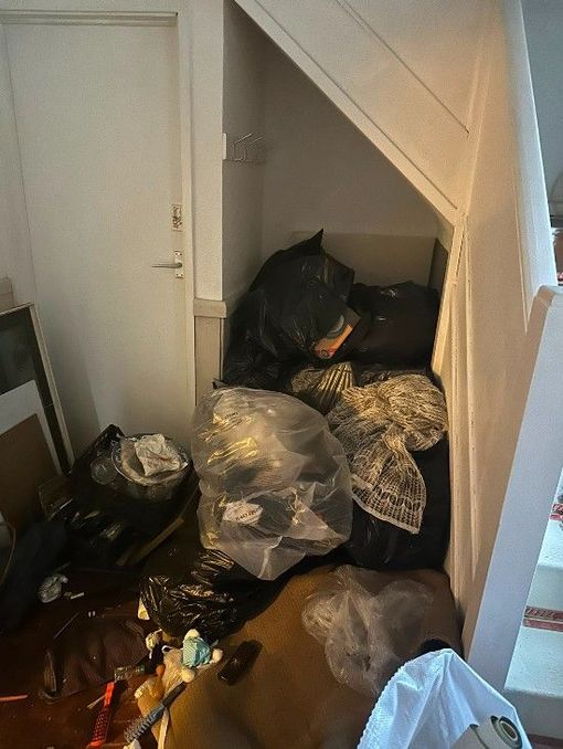 bags left in the hallway to be cleared by J&Z House Clearance