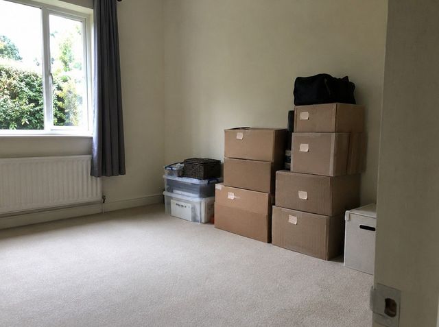 Tenant belongings boxed and set aside during a landlord clearance in Cardiff
